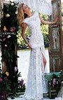 Style 50023 Sherri Hill Ivory/Nude Lace Appliqued Open Back Slit Prom Gown
