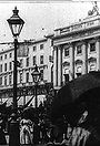 Leisurely Pedestrians, Open Topped Buses and Hansom Cabs with Trotting Horses