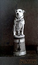 Dog on pedestal