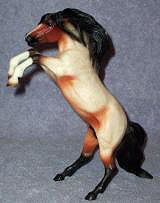 Breyer Classic Fighting Mesteño red roan Rufo