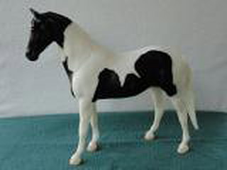 Breyer Classic Jet Run Black Tobiano Pinto is in your collection!