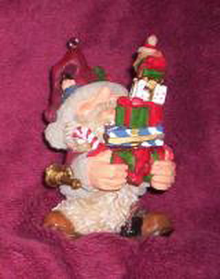 Gnome Figurine - Santa Gnome Holding Presents