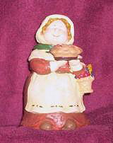 Hobbit Woman with Pie Figurine