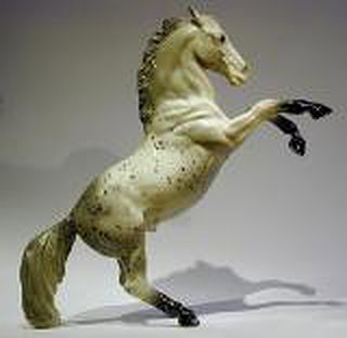 Breyer Fighting Stallion Glossy Grey Appaloosa is in your collection!