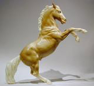 Breyer Fighting Stallion Glossy Palomino is in your collection!