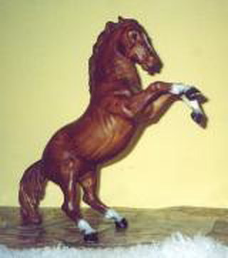Breyer Fighting Stallion Woodgrain is in your collection!